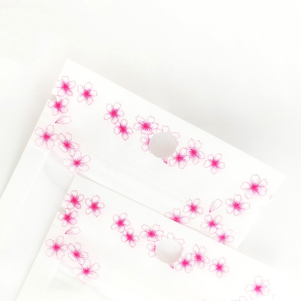 Glossy Floral White and Flower Border Design Polyethylene Flat Bags with Hang Hole - Katady packaging