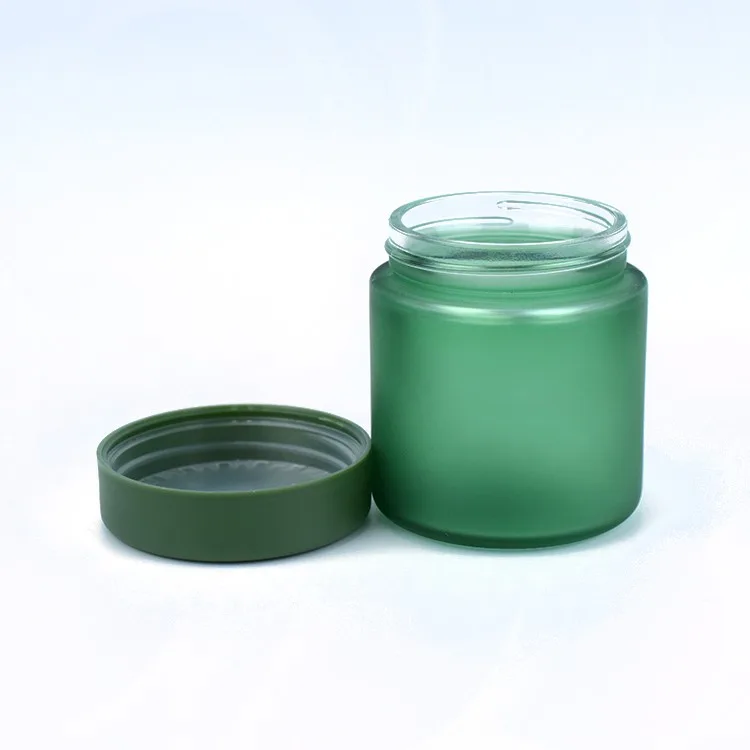Dark green color child resistant glass jar Dark green color child resistant glass jar