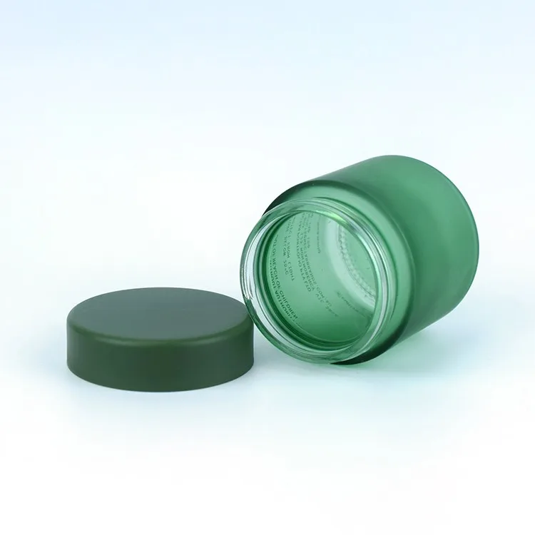 Dark green color child resistant glass jar Dark green color child resistant glass jar