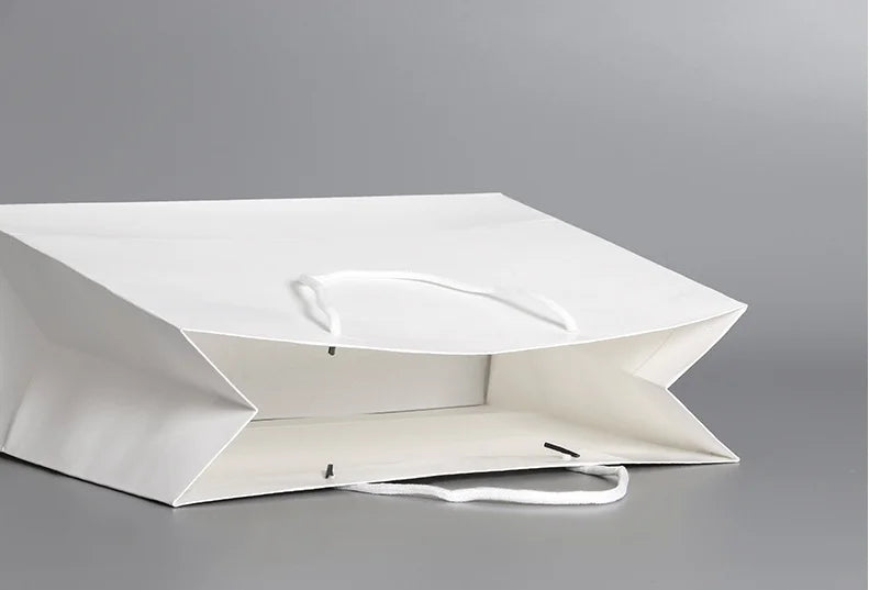 Customized logo White Paper Bag with Handle Rope Customized logo White Paper Bag with Handle Rope