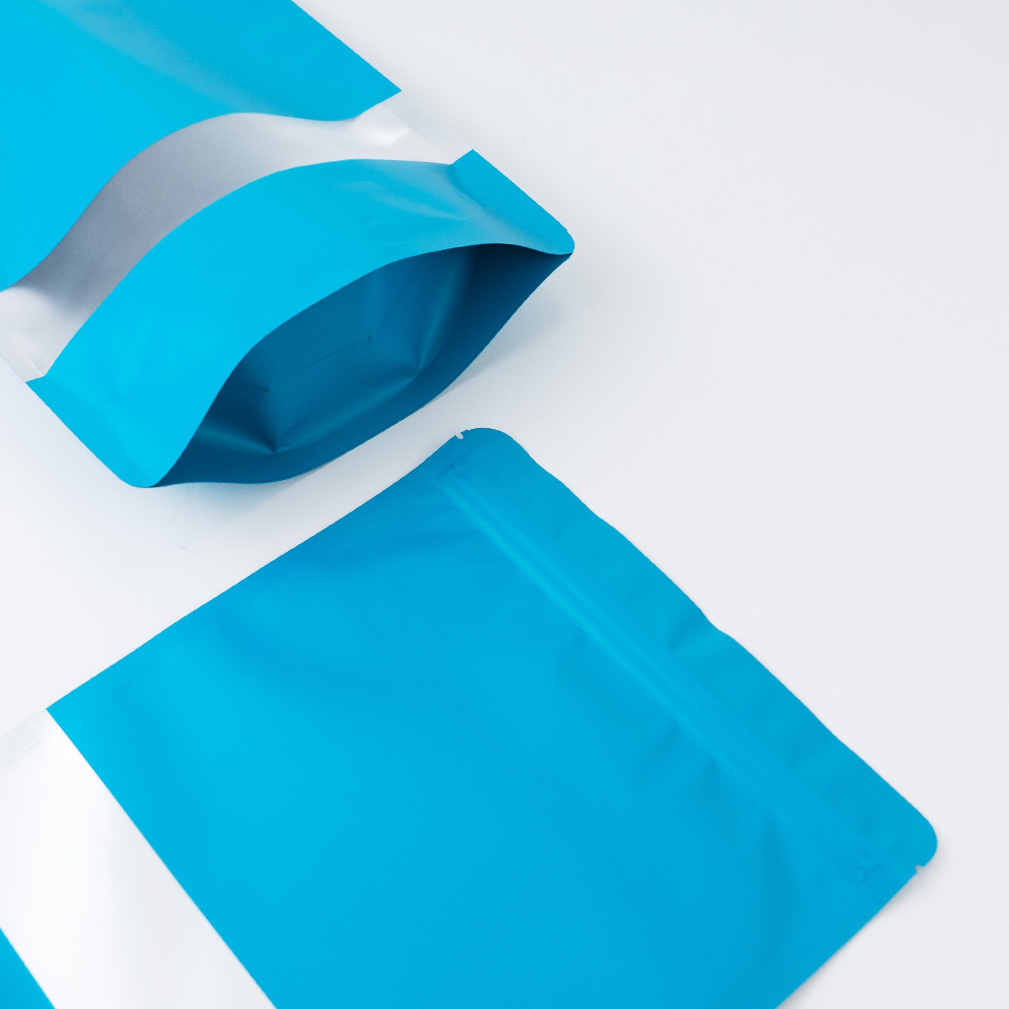 Matte Shock Blue Window Mylar Stand Strong Bags Matte Shock Blue Window Mylar Stand Strong Bags