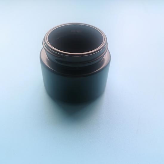 Straight sided rounded child resistant glass bottle Straight sided rounded child resistant glass bottle