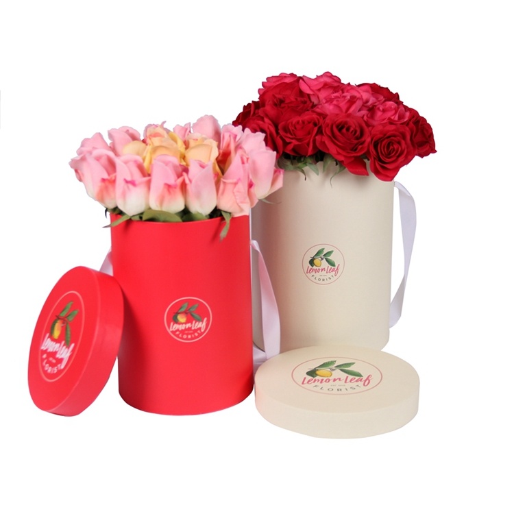 Rose round flower box with silk ribbon and handle Rose round flower box with silk ribbon and handle