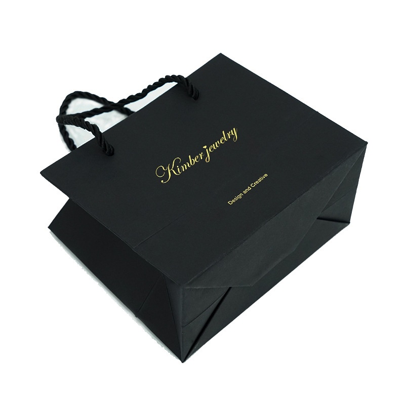 Shopping paper bag with rope handles for clothing packaging Shopping paper bag with rope handles for clothing packaging-katady.com