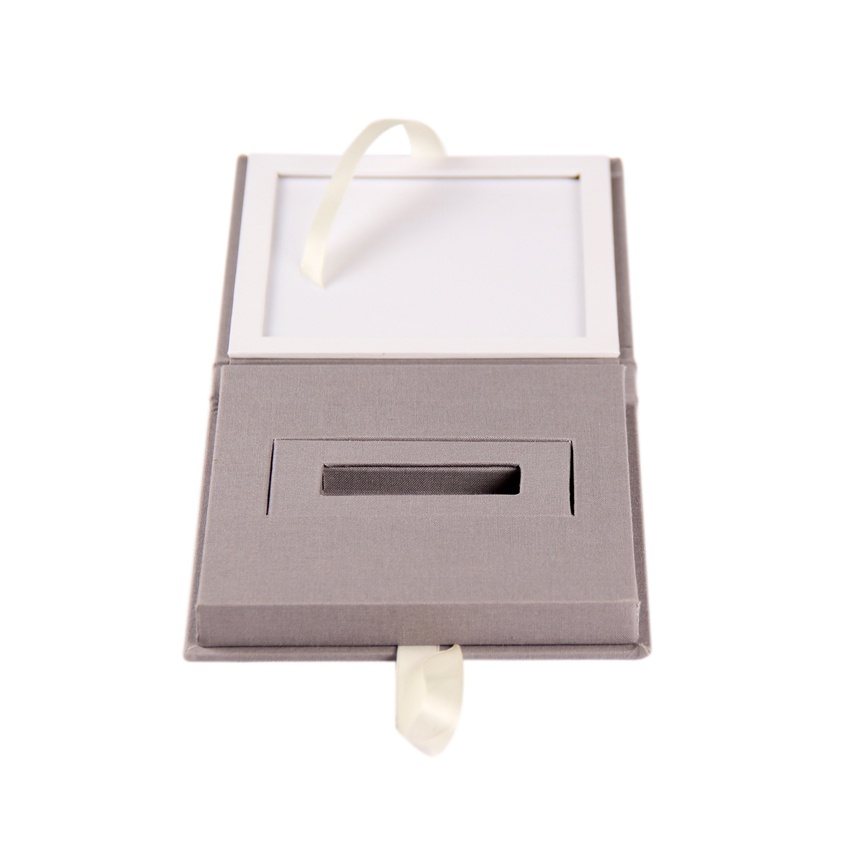Wedding invitation gift box with ribbon closure Wedding invitation gift box with ribbon closure