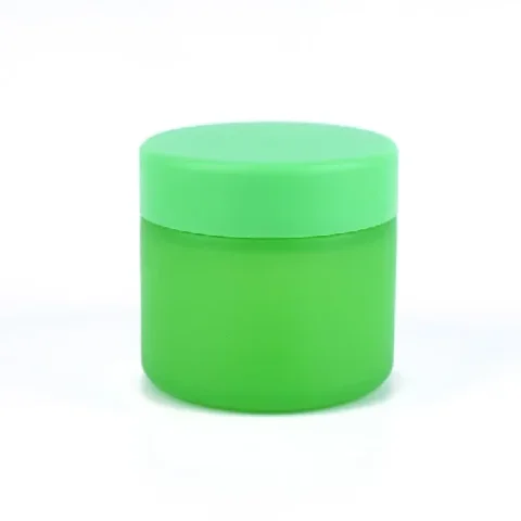 Green color child resistant glass jar